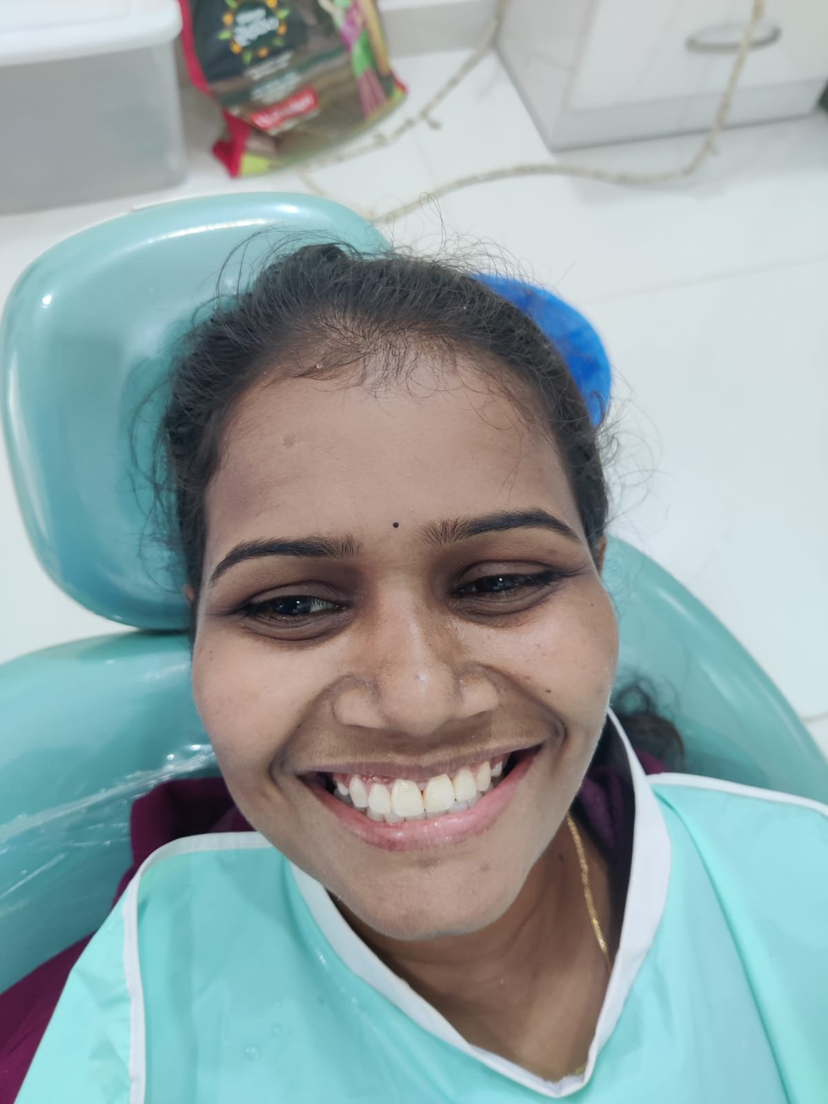 Patient Smiling After Dental Work at Sri Ramachandra Dental Hospital